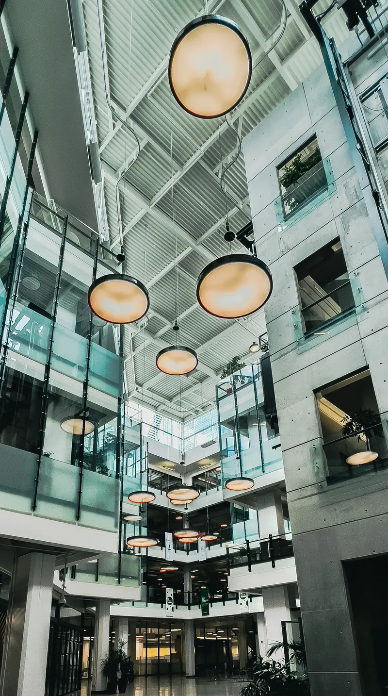 Pendant lights in a bright commercial atrium